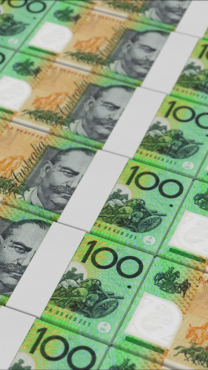 화폐 프레스에 의해 인쇄 된 100 오스트레일리아 달러 지폐의 수직 비디오