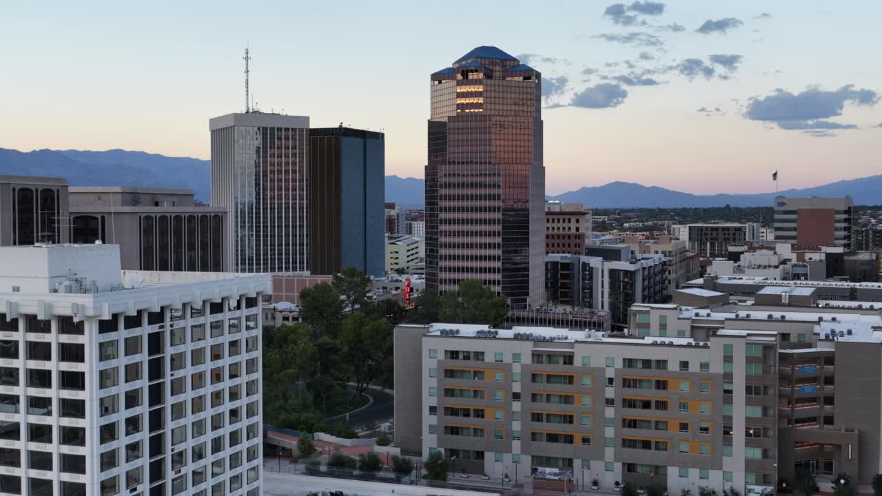 Ascending drone shot of downtown Tucson, Arizona at sunset