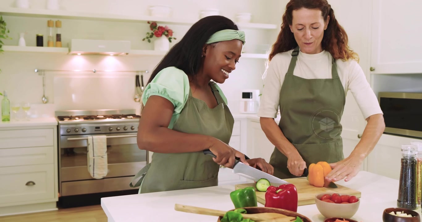 Two women slicing cucumber and halving pepper for salad while digital icons flickering around them