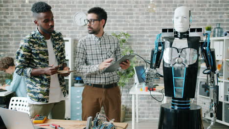 team of engineers working on a robot prototype