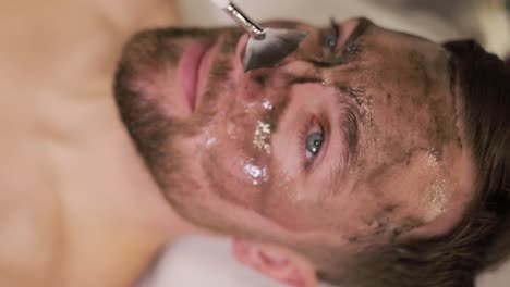 charcoal facial mask application