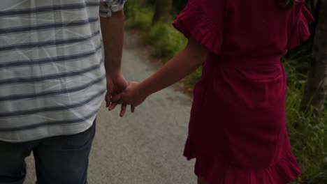 Couple-in-love-walking-on-path-in-countryside