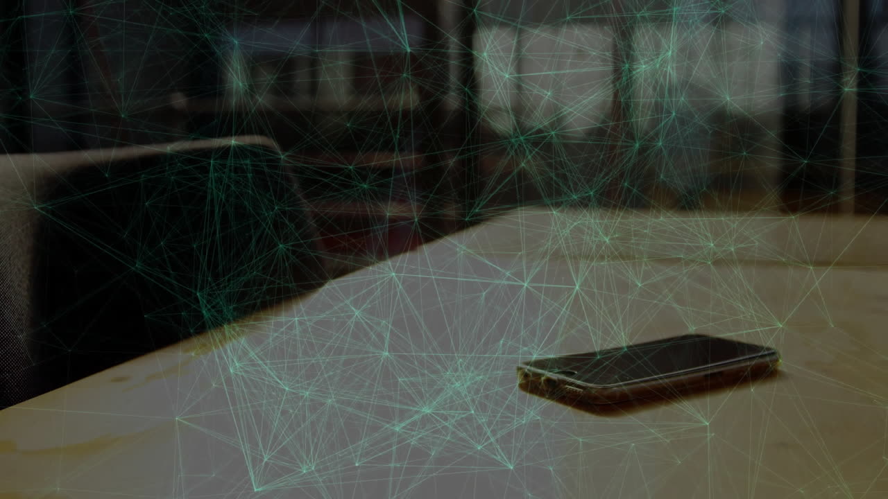 사무실 테이블에 있는 스마트폰을 통해 네트워크 연결 애니메이션