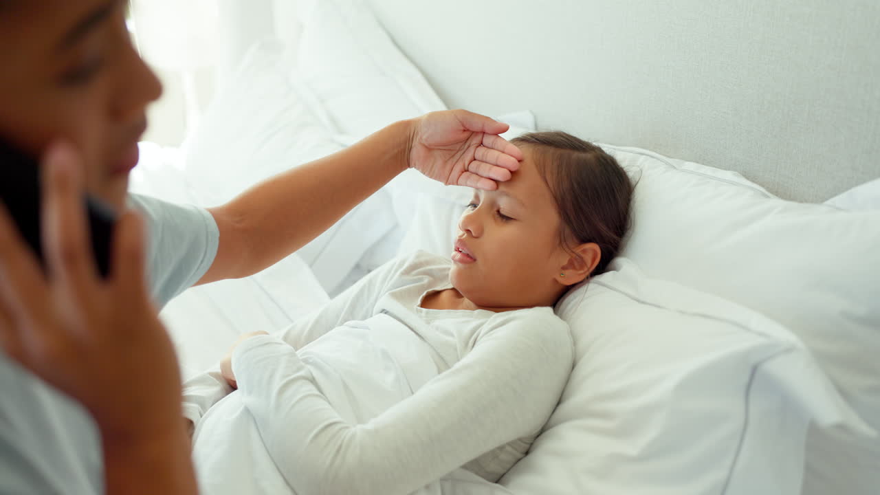 Mother, phone call and sick child in bed