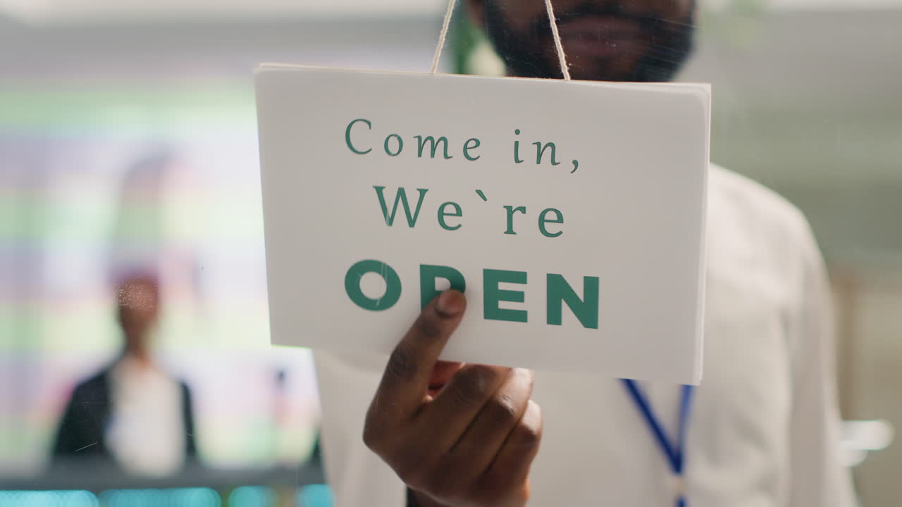 Retail assistant closing clothing store