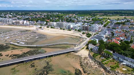 Pornichet Marina and Plage de Libraires beach at low tide, France. Aerial drone panoramic view