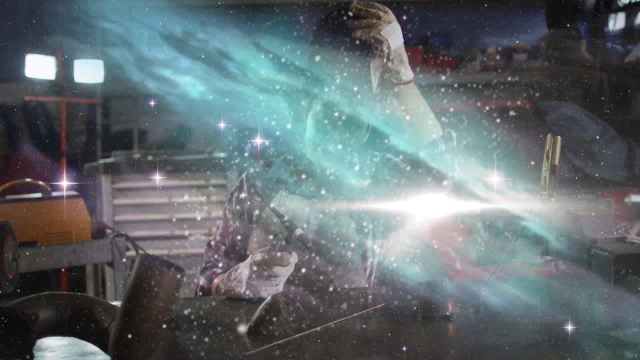 woman using welding torch in metal workshop, producing sparks with turquoise nebula overlay