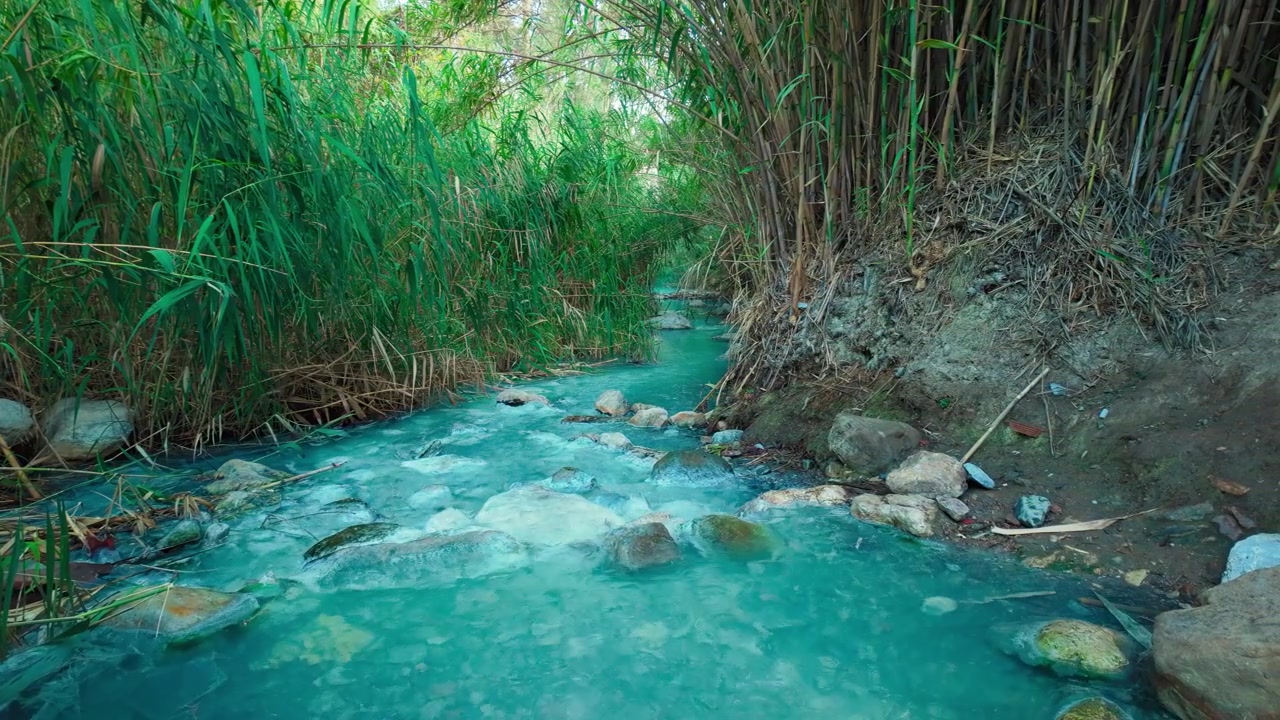 Natural hot springs river at Hedionda de Casares, Spain