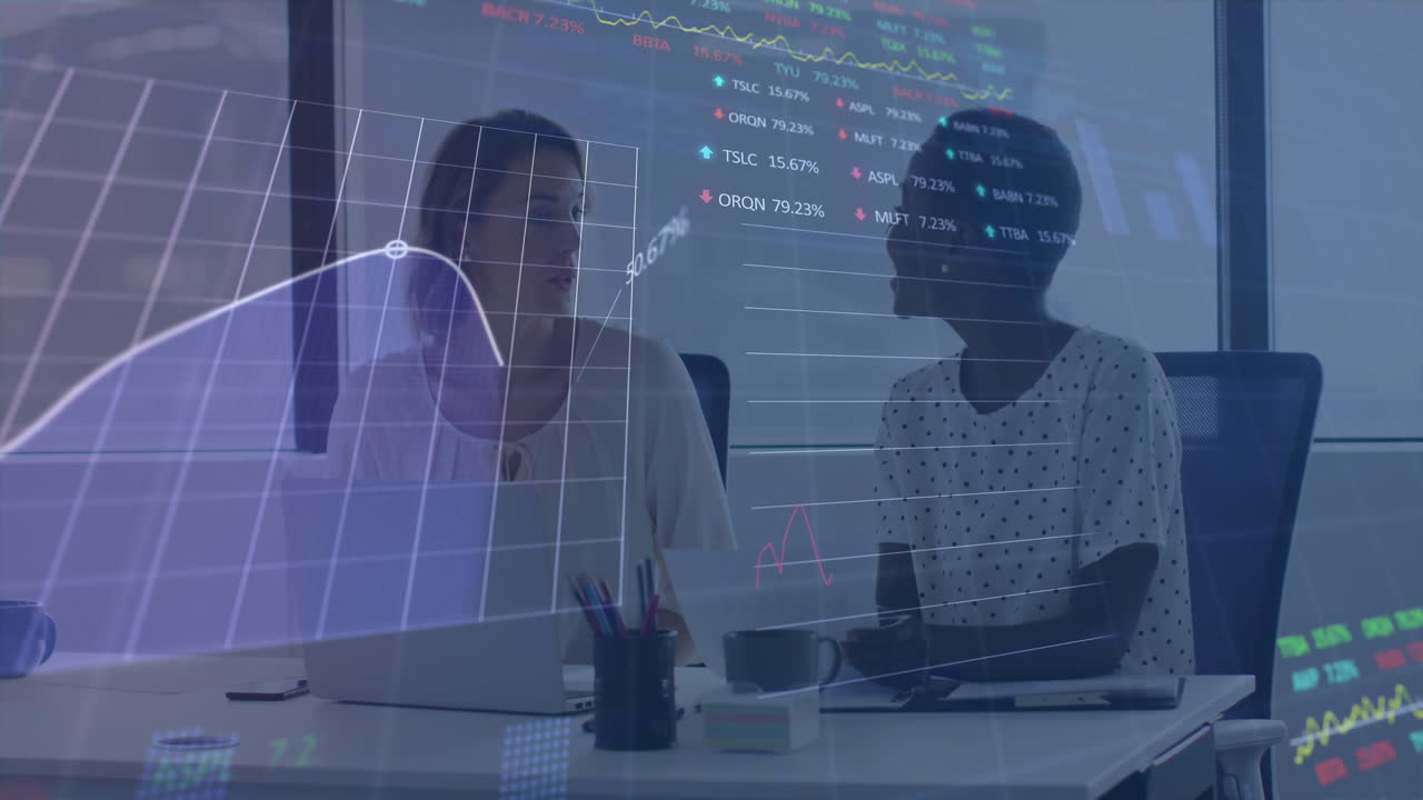Animation of statistical, stock market data processing over two diverse women discussing at office