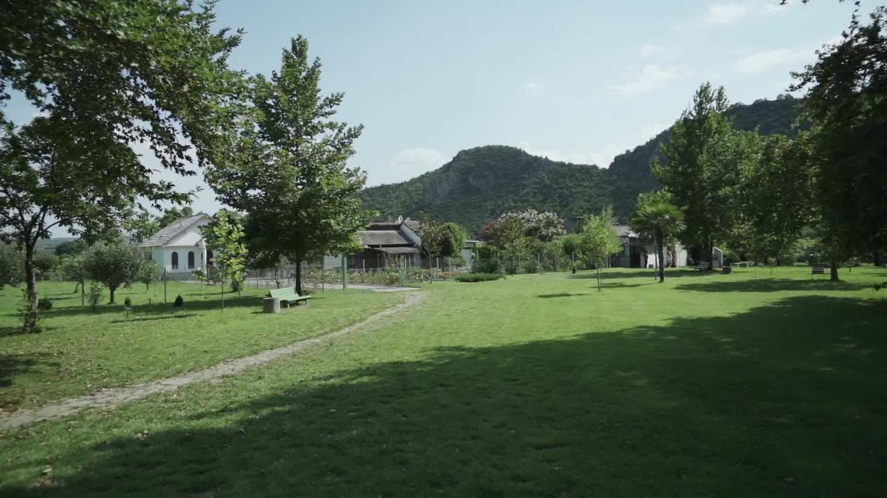 Panning from the left to the right side of the frame showing the expanse of Baba Vanga's former residence, the famous Balkan Nostradamus, located in Rupite, Petrich in Bulgaria.