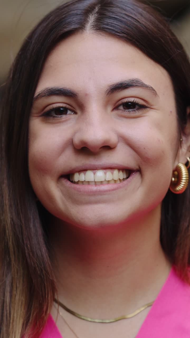 Portrait of a smiling woman wearing jewelry