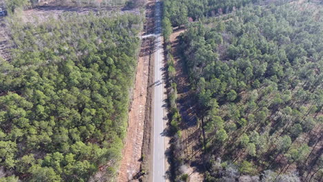Drone-shot-moving-down-a-back-road-in-North-Carolina