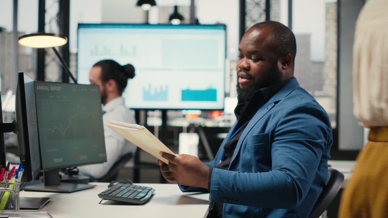 Vertical Video Professional archivist uses rolling trolley to transport documents