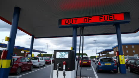 gas station with fuel pumps and ev charging points, showing cars and close-ups of the nozzles
