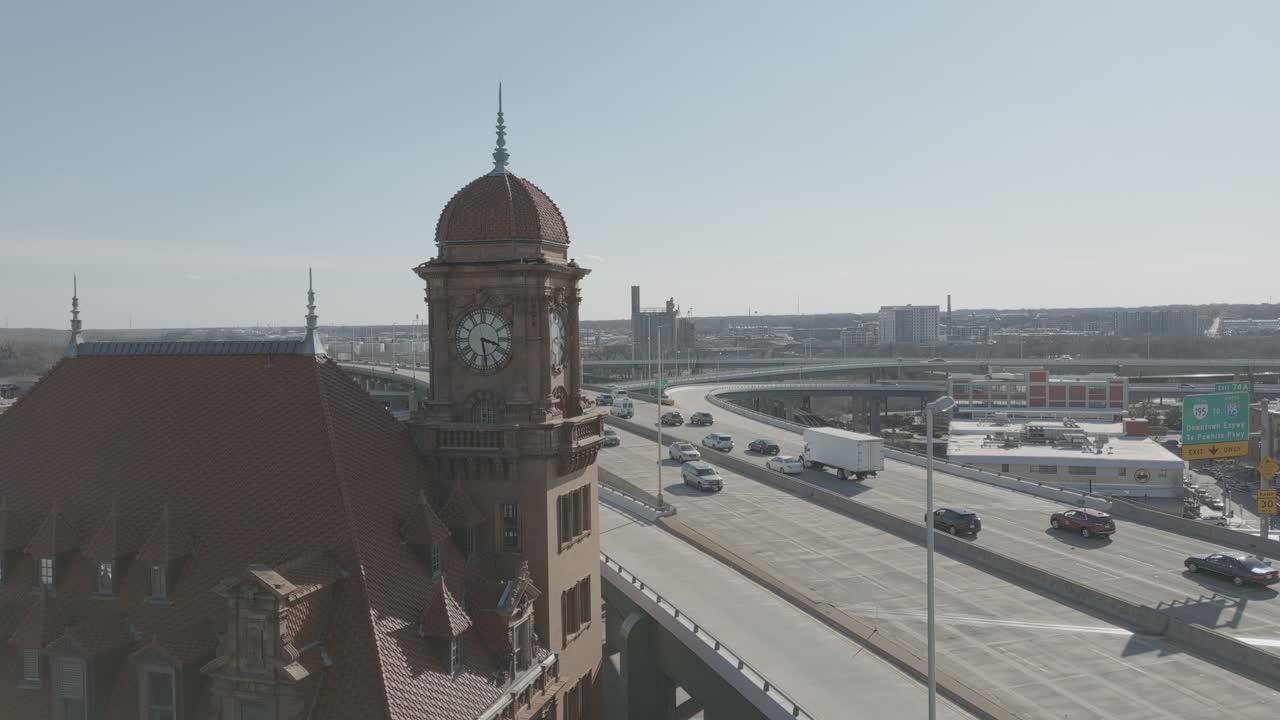 Shot of cars driving down the highway with a clock tower on the train station in Richmond VA. Footage is 4K60fps and shot in LOG color for personalized color editing