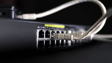 network switch with ethernet utp cables panning shot