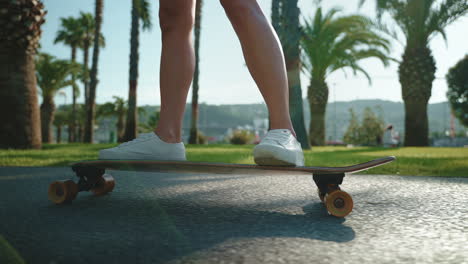 woman skateboarding in a park