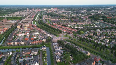 tranquil sunset aerial of vathorst, amersfoort with picturesque homes and soft golden light