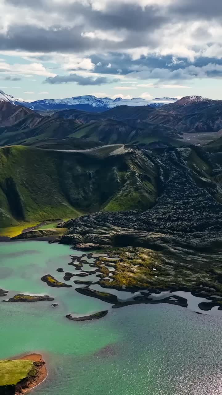 Epic volcanic rock formations with old lava flow in lake