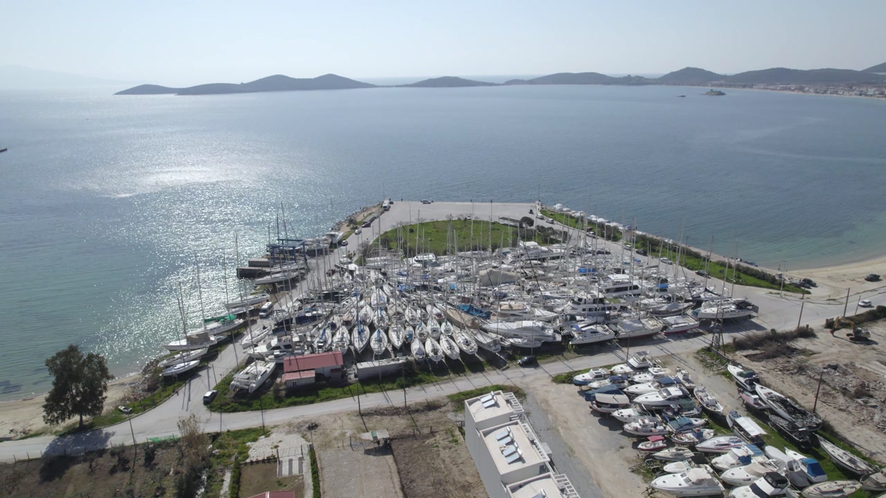 Shipyard Aerial Point of Interest Shot, Sail Boats Stored on Land Drone View in Nea Peramos Marina, Kavala Greece