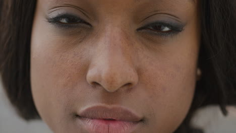 portrait serious african american woman looking at camera