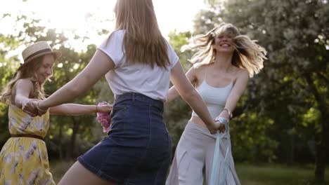 Cheerful-Girlfriends-Having-Fun-Together-Outdoors