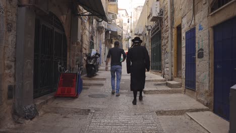 a local resident on the narrow street of mea shearim