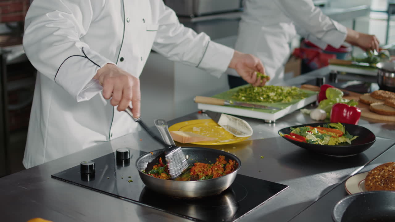 Professional cook preparing culinary recipe with vegetables