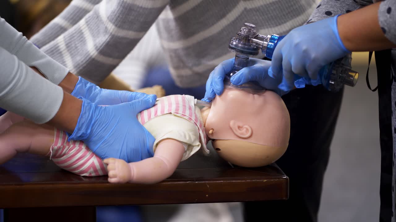Cardiopulmonary resuscitation on baby. Education healthcare first aid of cardiopulmonary resuscitation on baby