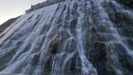 december 2020: the newly opened stunning khorfakkan artificial waterfall in sharjah, the new tourist destination in united arab emirates