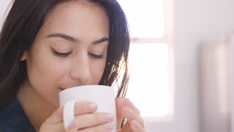 -Thoughtful-woman-having-coffee-