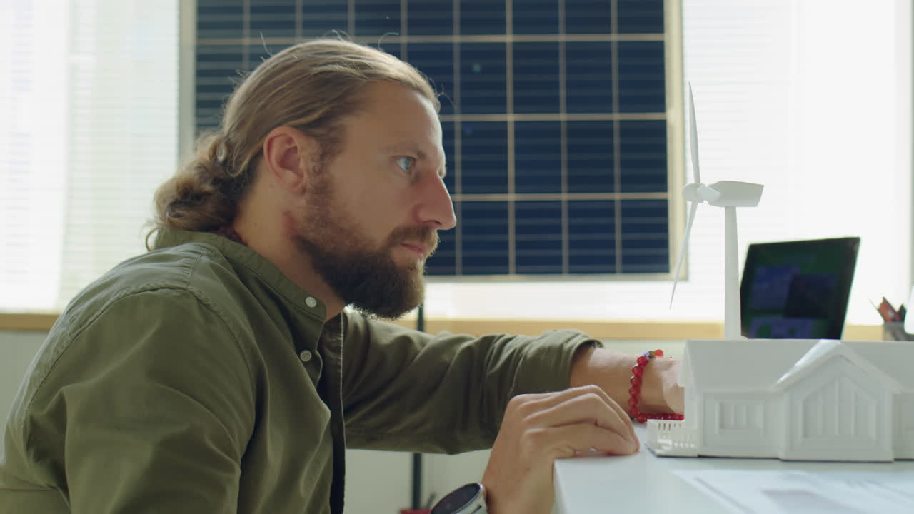 Renewable Energy Engineer Working on Project