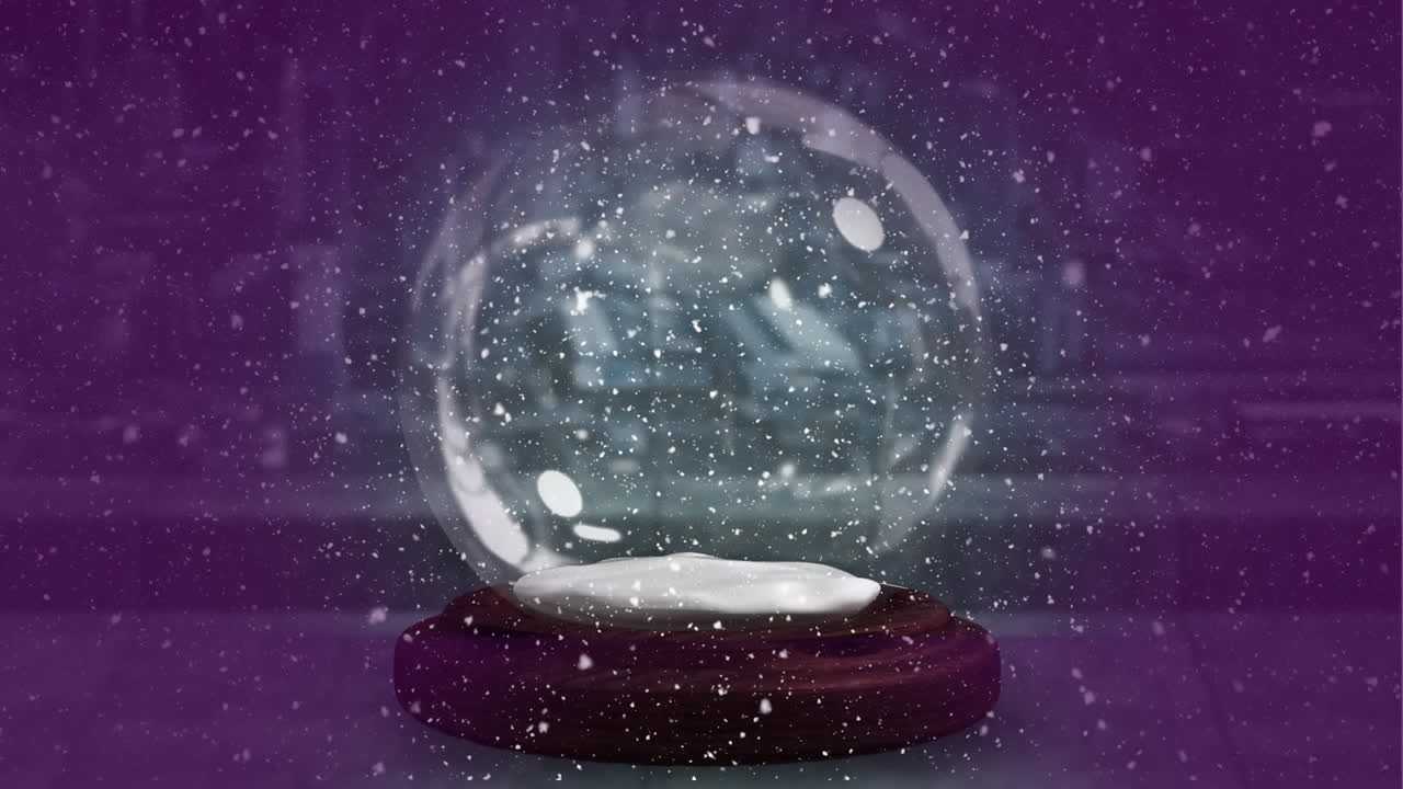 도시 풍경 위에 내리는 눈과 유리 눈공의 애니메이션