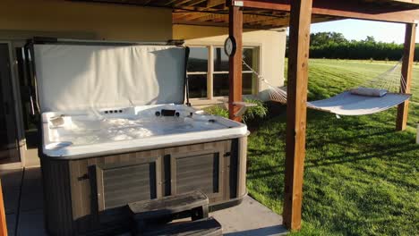 Outdoor-hot-tub,-open-and-ready-for-therapy-treatment