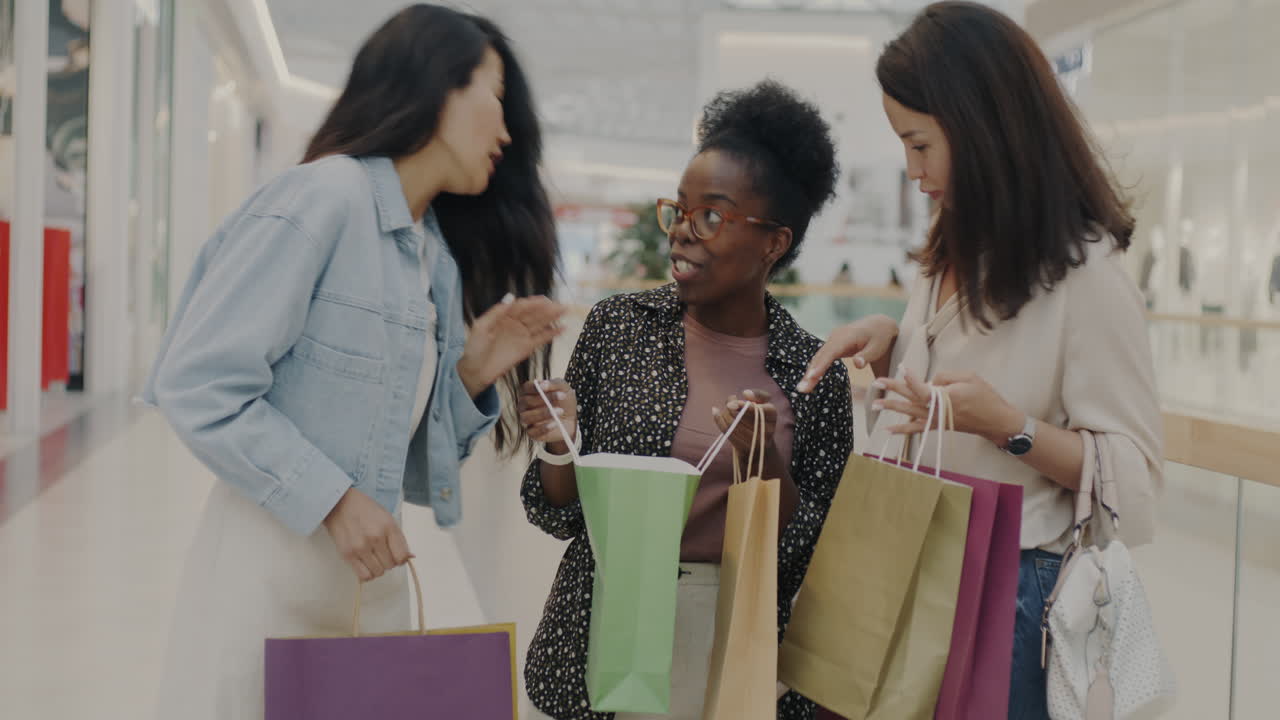 Friends Shopping Together in a Mall