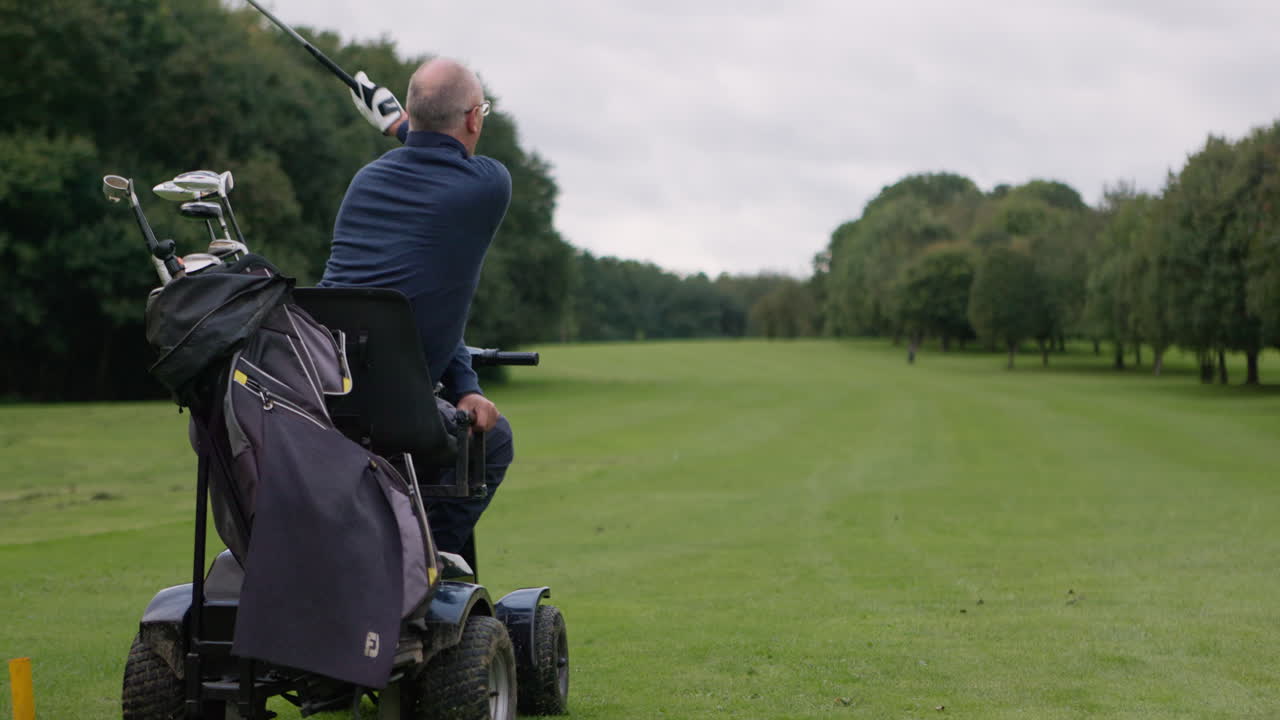 A golfer with a disability playing golf on a golf course