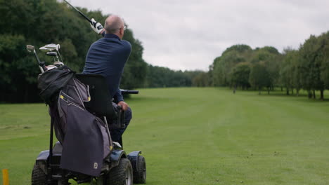 a golfer with a disability playing golf on a golf course