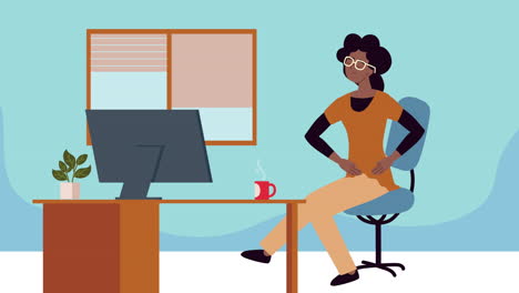 afro woman taking an active break seated in the office