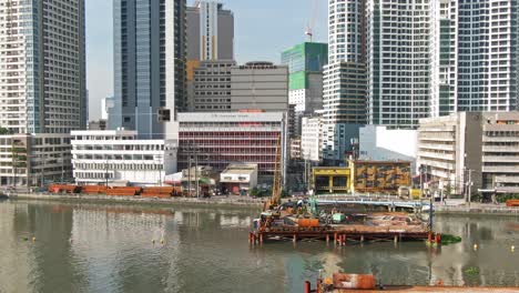 Aerial-view-of-modern-skylines-alongside-the-river