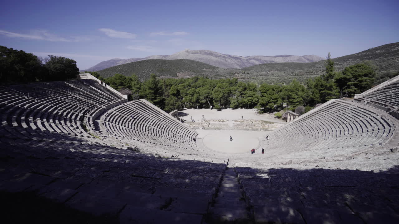 The Historical Theatre Of Ancient Greece In Athens On A Sunny Day - high angle panning shot