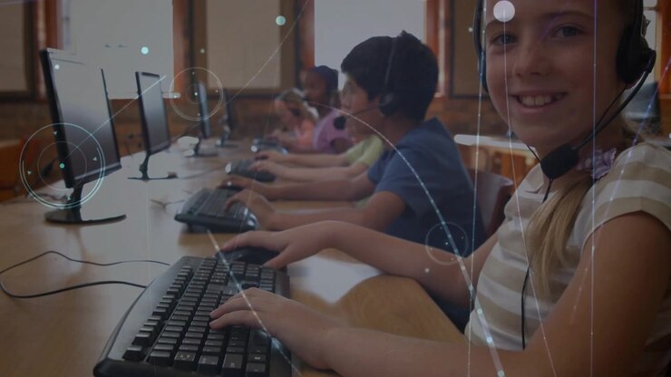 Students typing speaking into mics as camera panning keyboards revealing learning circles and lines