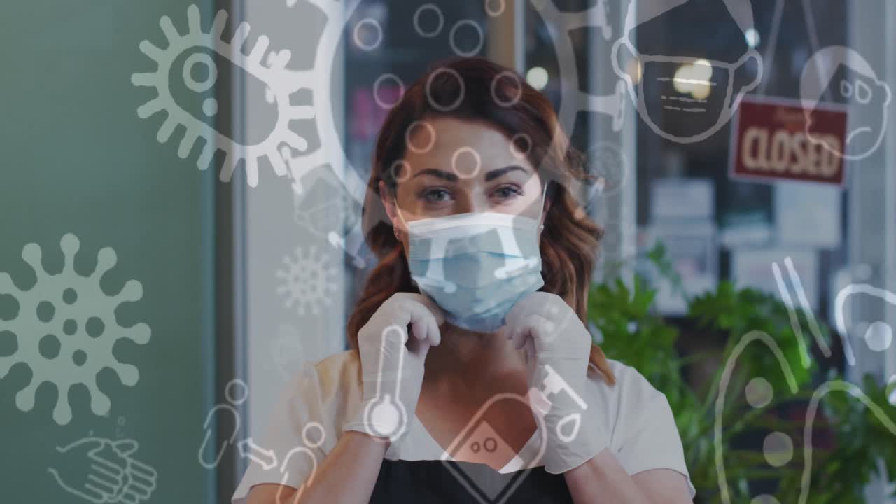 animación de iconos de coronavirus sobre una peluquera caucásica que lleva una máscara facial