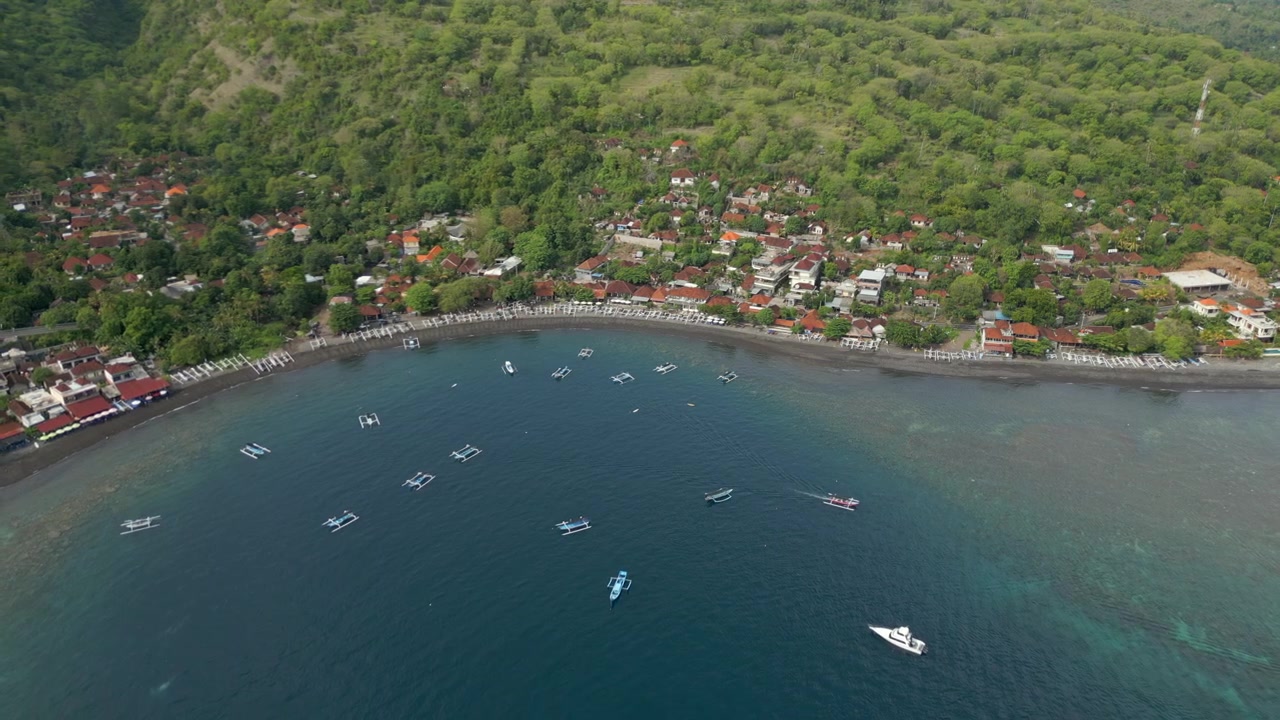 Serene Jemeluk Bay Near Amed Bali Indonesia Lush Jungle And Blue Ocean Drone High Angle 4K 60FPS