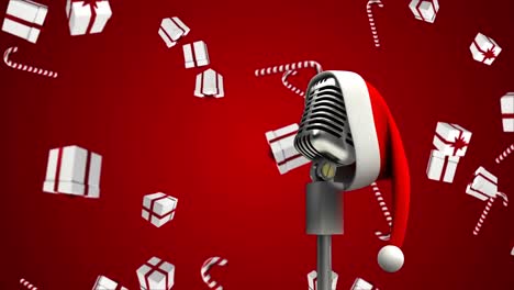 Animation-of-santa-hat-on-vintage-microphone-with-christmas-presents-falling-on-red-background