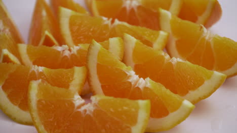 juicy orange slices wedges isolated on white background stable motion fresh fruit high in vitamin c, healthy food choices