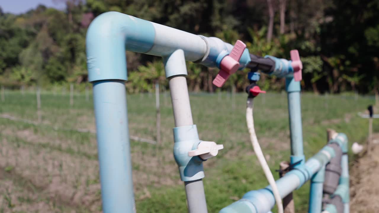 PVC Irrigation System in a Sunny Agricultural Field