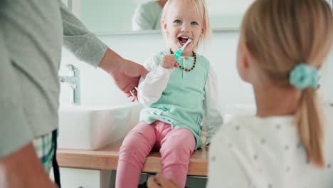 father, children and brushing teeth in bathroom