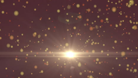 animation of glowing particles floating over bright light burst on dark background