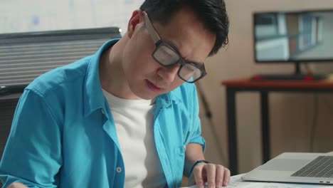 man working at a desk