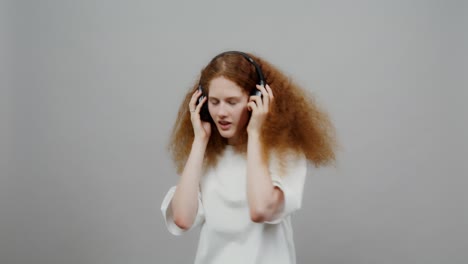 woman listening to music and dancing